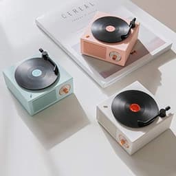 Deze retro-klassieke witte Bluetooth-speaker heeft een schattig platenspelerontwerp en is daarmee een perfect cadeau voor meisjes. Hij beschikt over een verbeterde bas en een luid volume. — thumbnail 4