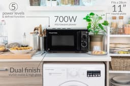 Compacte Zwarte Handmagnetron met Uniek Textuurdesign en 700W Vermogen — thumbnail 5