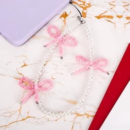 2 stuks kralen telefoonhangers met strikjes, universele esthetische delicate schattige parel strik kralen telefoon polsband voor tas camera oordopjes hoesjes decoratie (roze en paars) — thumbnail 4