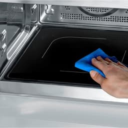 Magnetron met heteluchtfunctie - Oven magnetron - Snel maaltijden bereiden - Glazen bodem zonder draaiplateau - 25 Liter - Zwart RVS — thumbnail 3