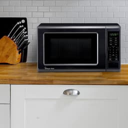 Compacte Magnetron - Kleine Keukenoven - Snel Opwarmen - 6 Voorgeprogrammeerde Instellingen - 700 Watt - Zwart — thumbnail 4