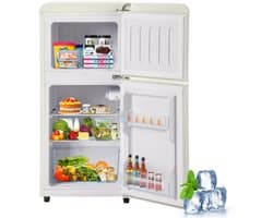 Retro koelkast. Vriescombinatie. 88,8 cm hoog, 45,5 cm breed, tweedeurs, met een totaal volume van 60 liter, een vriescapaciteit van 22 liter. 102 kWh/jaar, -27 °C ∽ 13 °C, ledverlichting. Crèmewit, energieklasse E.