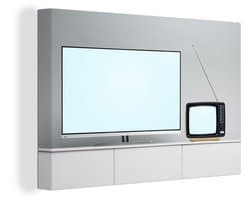 Canvas Schilderij Een flat screen televisie naast een retro televisie - 90x60 cm - Wanddecoratie