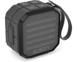 Aukey SK-M13 - Draagbare Mini Bluetooth-luidspreker met ingebouwde microfoon - draadloze verbinding tot 10 m - waterbestendig IP65 - Grijs