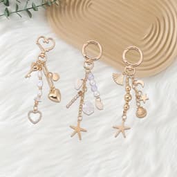 3 Stks Gouden Strandtas Sleutelhanger Leuke Zeester Parel Zeeschelp Portemonnee Charms Parel Kralen Sleutelhanger Charms voor Rugzakken Portefeuilles Lunch Dozen Zomer Reizen Geschenken voor — thumbnail 5