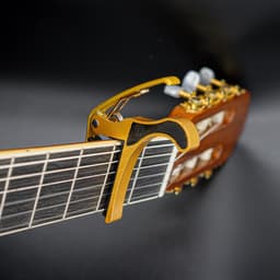 Universele Capo - Goud - Capo Akoestische / Klassieke / Elektrische gitaar - Capo Gitaar klem — thumbnail 3