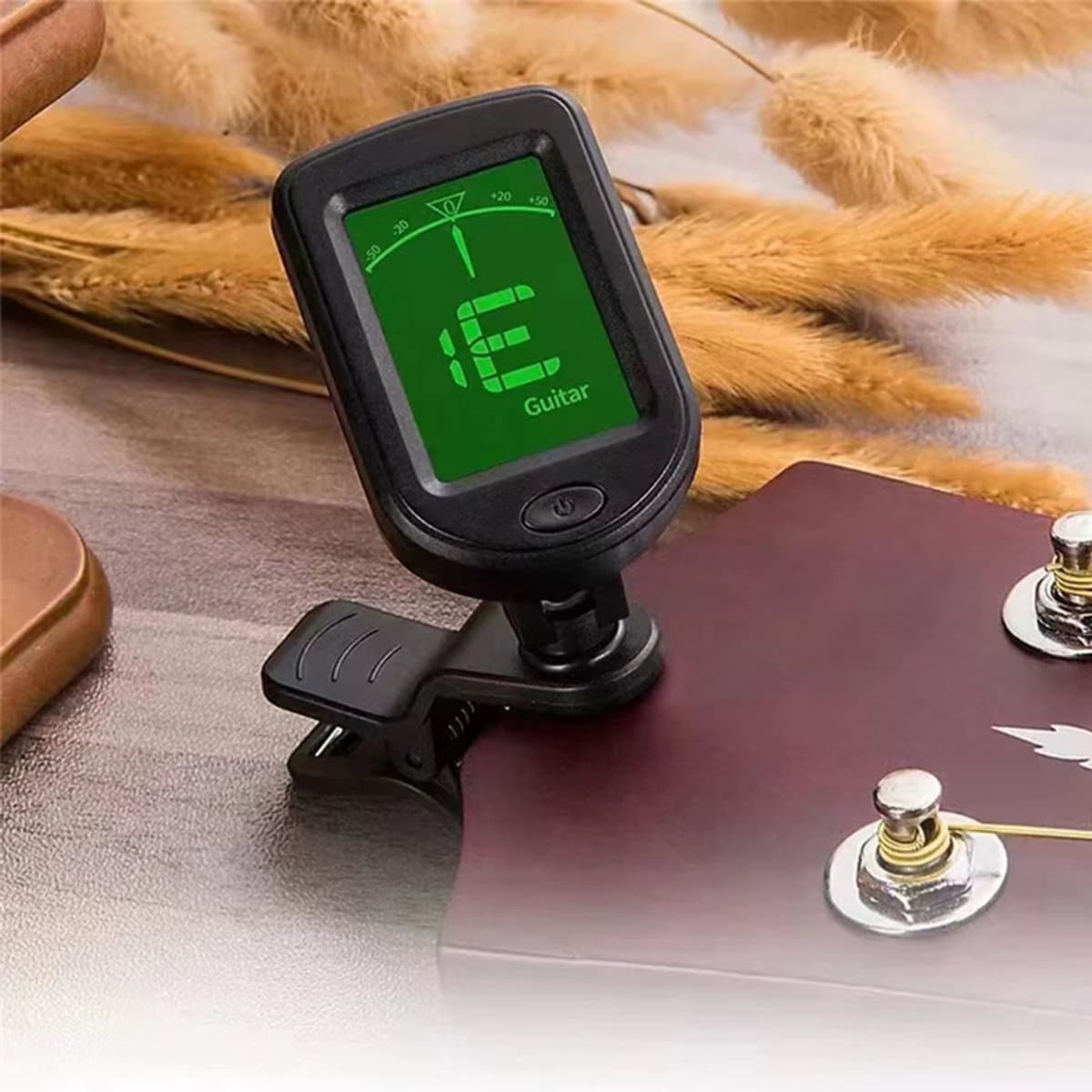 Clip-on tuner - Stemapparaat - Snaarinstrument - Stemmen - Gitaar stemmen - Digitaal — afbeelding 1