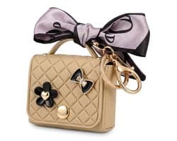 Abrikoos kleurig hoesje voor oordopjes dames met strik en decoratieve details geschikt voor AirPods 4 kunstleer hardcase met ring en lint