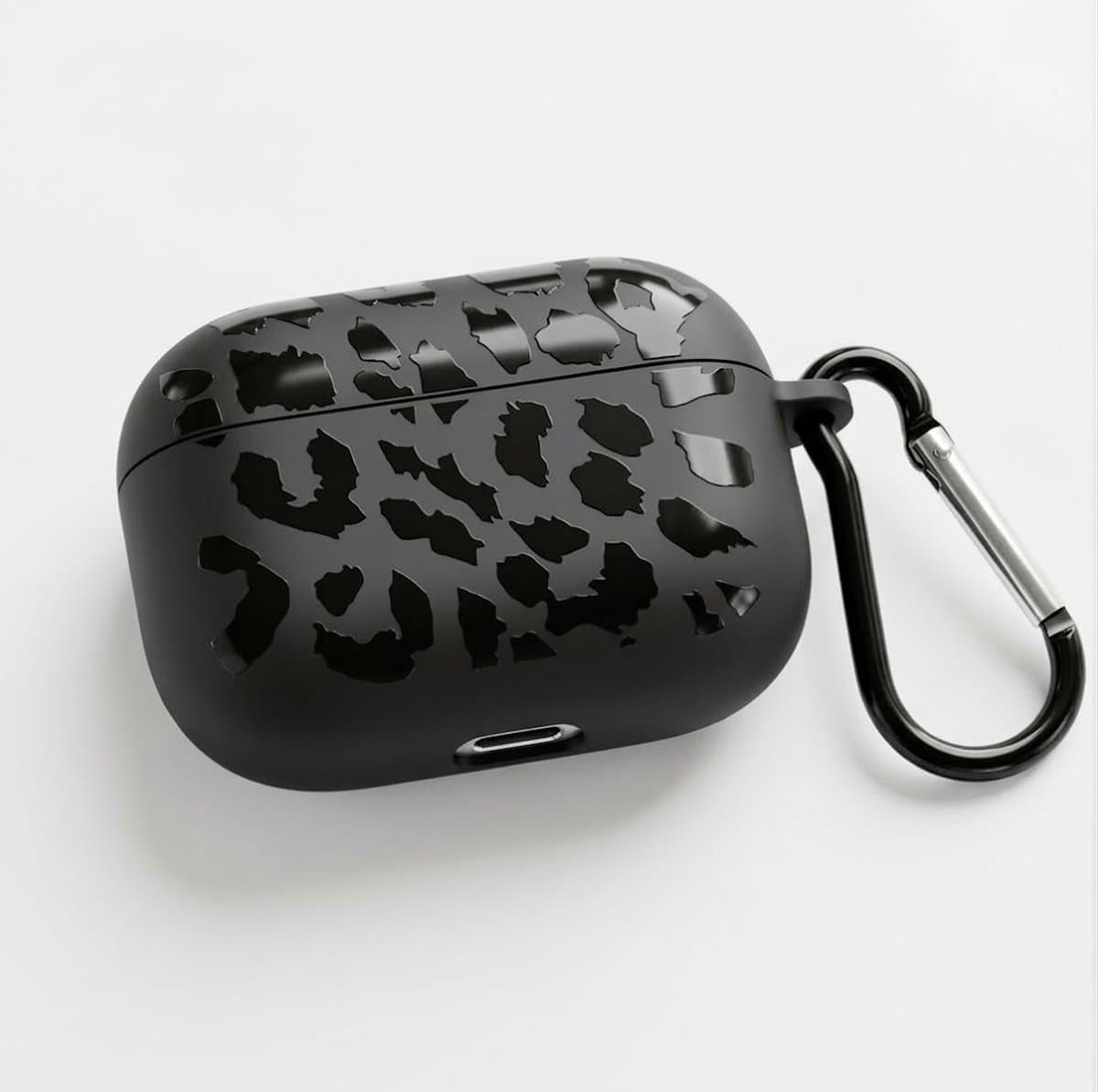 Zwart grafisch patroon hoesje voor oordopjes geschikt voor AirPods Pro 2 – compact beschermhoesje met onregelmatige print, mat oppervlak en karabijnhaak — afbeelding 1